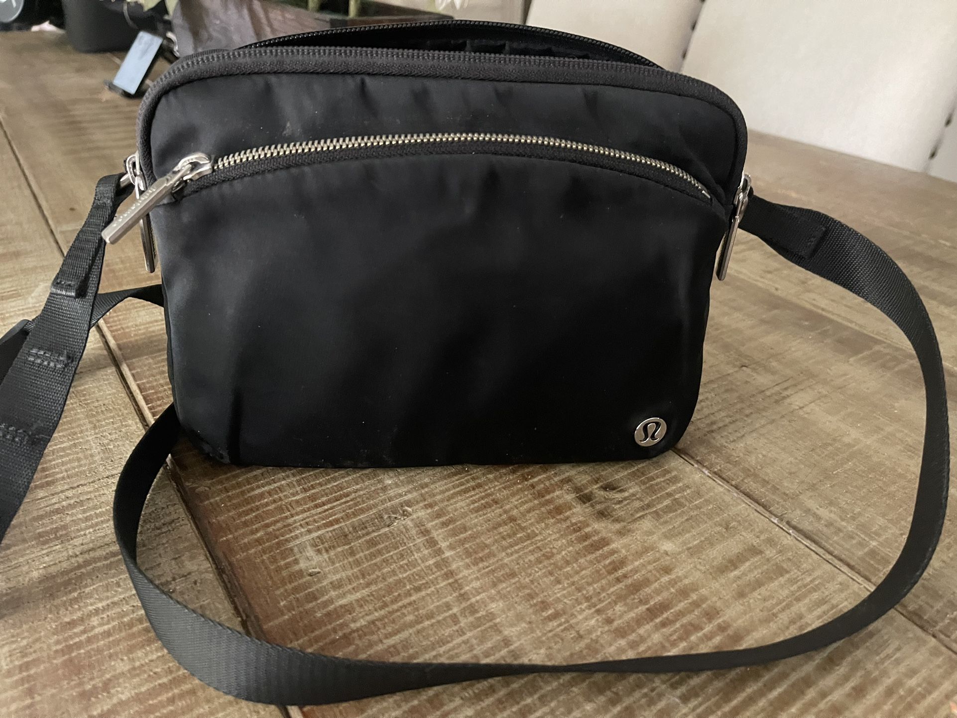 lululemon black shoulder bag Everywhere Belt The Shop at Equinox Zippered Main Compartment. Lululemon athletica Everywhere Sling Bag
