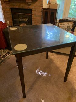Moving sale dinning table with glass top and 2 chairs
