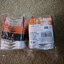 2 Packs Of Vampire Teeth 