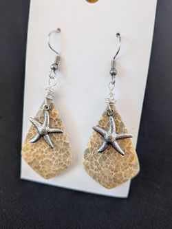 Handmade fossil coral dangle earrings with starfish