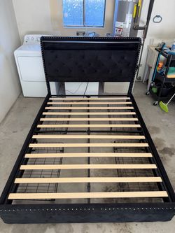 Complete Queen bed frame with 4 roll out drawers