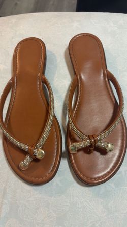 Brown leather flip flops with rhinestone embellishments