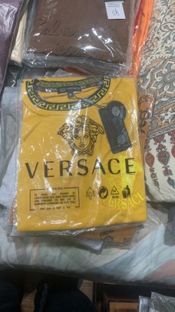 Brand new designer tees size M