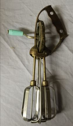 Old hand mixer turquoise nob made to last