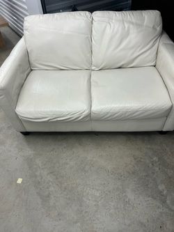 Leather white love seat