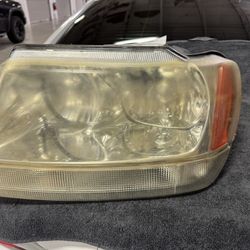Driver Headlight Crystal Clear Fits 99-04 GRAND CHEROKEE 312894