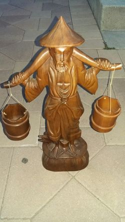 Hand carved water man 22"h
