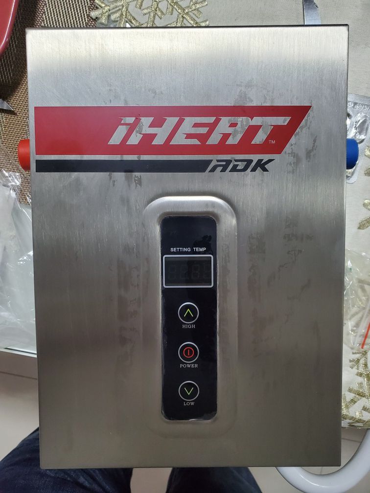 Water heater tankless new (titan)