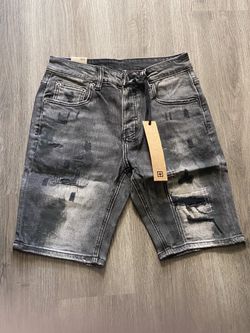 Black distressed Ksubi shorts