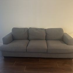 Rarely used 3 seater grey couch