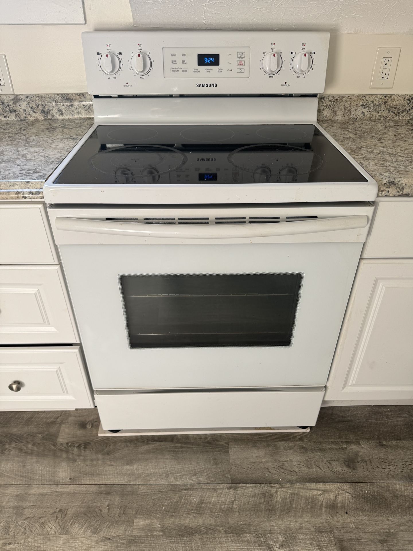 Samsung Electric Range & Frigidaire Refrigerator