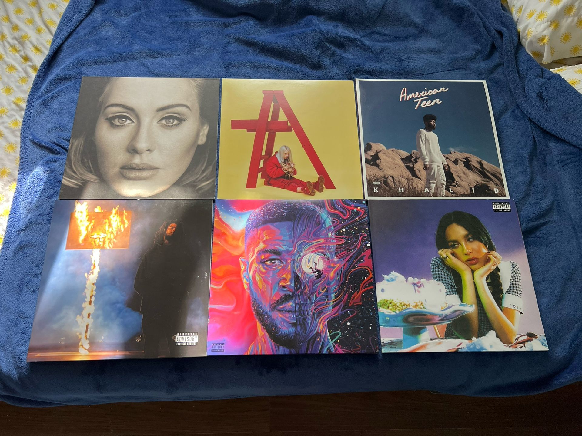 Vinyl Records: J. Cole, Olivia Rodrigo, Billie Eilish, Adele, Khalid, Kid Cudi