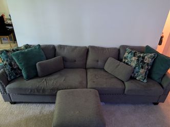 Couch with ottoman and pillows