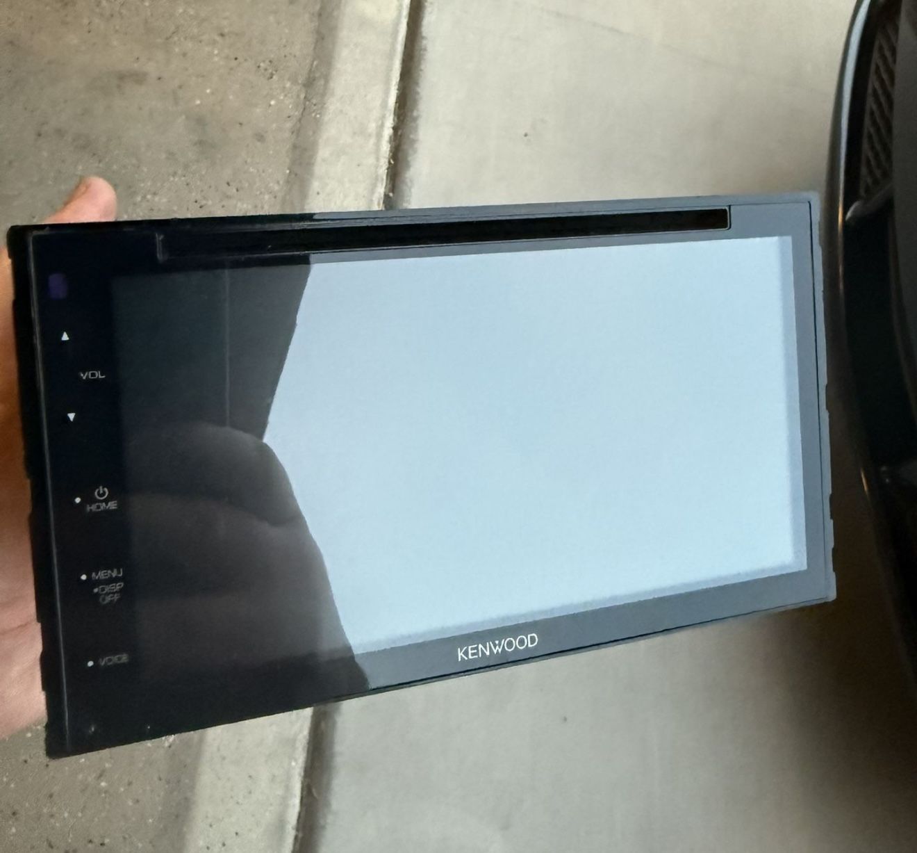 Kenwood DDX5707S monitor with a DVD receiver, a 2-DIN in-dash touchscreen car stereo that supports Apple CarPlay and Android Auto