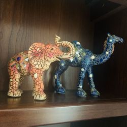 Ceramic elephant and camel showpieces