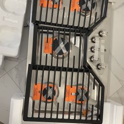 GE® 36" Built-In Gas Cooktop with 5 Burners and Dishwasher Safe Grates  Model #:JGP5036SLSS 