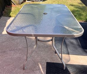 Glass patio table ( Table Only  )