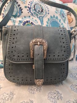 Teal Mudd brand purse