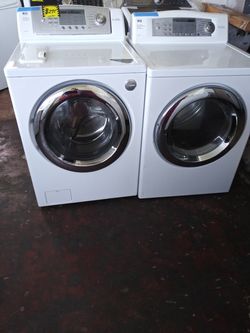LG front load washer and dryer set working perfectly