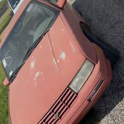 Red 1996 Chevy Corsica
