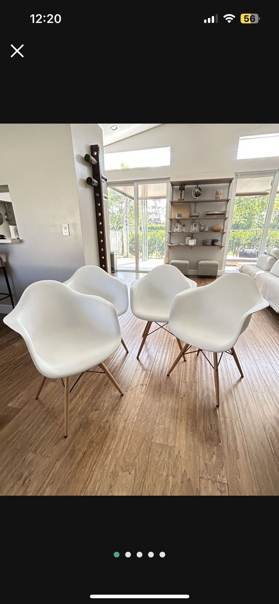 TWO (2) - Alonza Series white chairs with wooden legs.