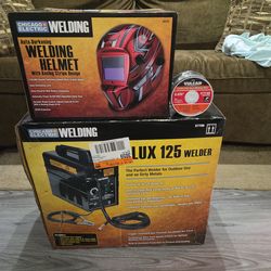 New in box Chicago electric welder, helmet, and wire.