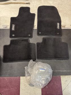 Jeep Grand Cherokee factory mats carpeted