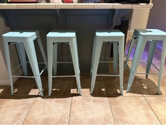 4 blue bar stools.