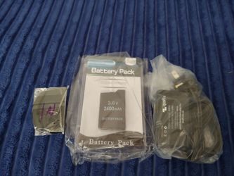 Battery charger and battery cover for psp system 2000 3000