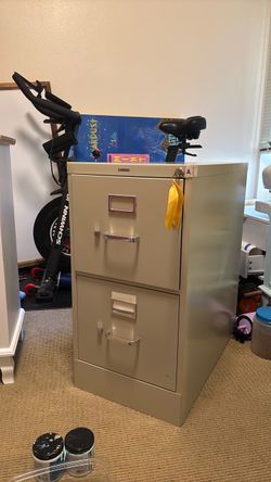 2 drawer filing cabinet. Has key!