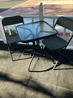 Outdoor glass top tables and 2 folding chairs