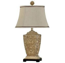 Single Pack Re-shippable Traditional carved table lamp in tortola cream finish