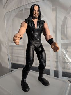 The Undertaker 14" Tall Action figure.