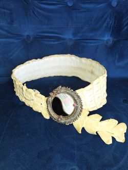 Sterling Silver, Mother of Pearl, Onyx , and genuine ruby Buckle with  genuine crocodile strap.