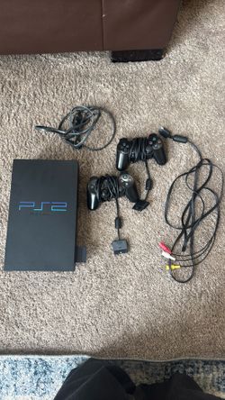 PlayStation 2 fat console, working with controllers, games, and cords. Accepting offers