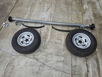 Tracker trailer Axel Assembly with Tires