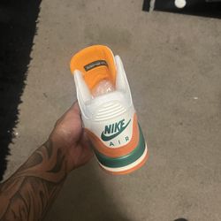 jordan white orange green 