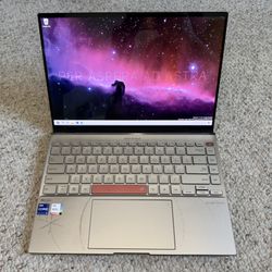 Selling a like-new ASUS ZenBook 14X OLED Space Edition (UX5401ZAS-XS99T) with an upgraded Intel AX210 Tri-Band Wi-Fi 6E and Bluetooth 5.3 card.