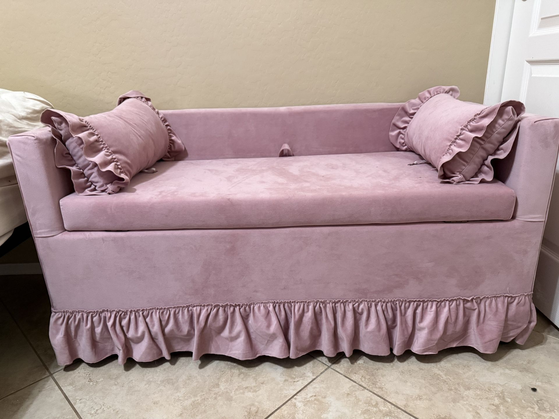 pink ottoman couch