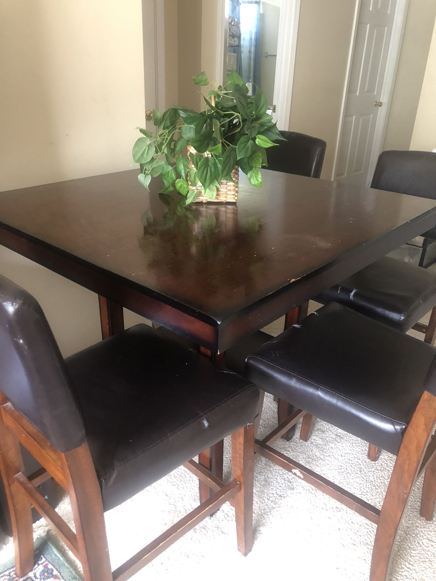 Table With 4 Chairs And Seat Covers For The Chairs