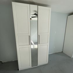 2 Pax Closet Systems With Drawers And Mirrors