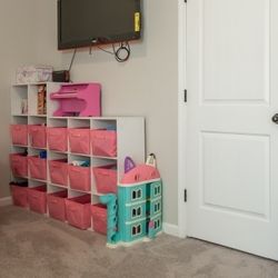 White Toy Storage Shelf With Pink Bins Included 