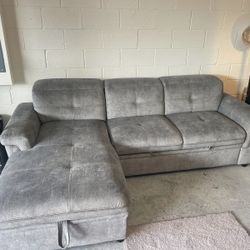 Barely Used Sectional with Storage and pullout bed