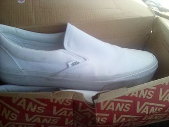 Slightly used white Vans slip ons size 8 mens