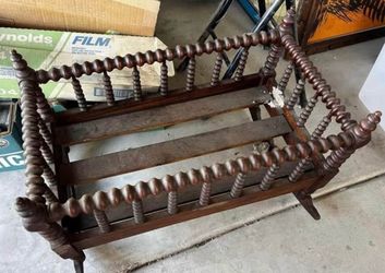 Antique rocking crib bed