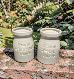 Pair of modern ceramic farmhouse-style milk jug planters/candle Holder