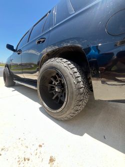 6x139.5 20” deep dish rims and tires