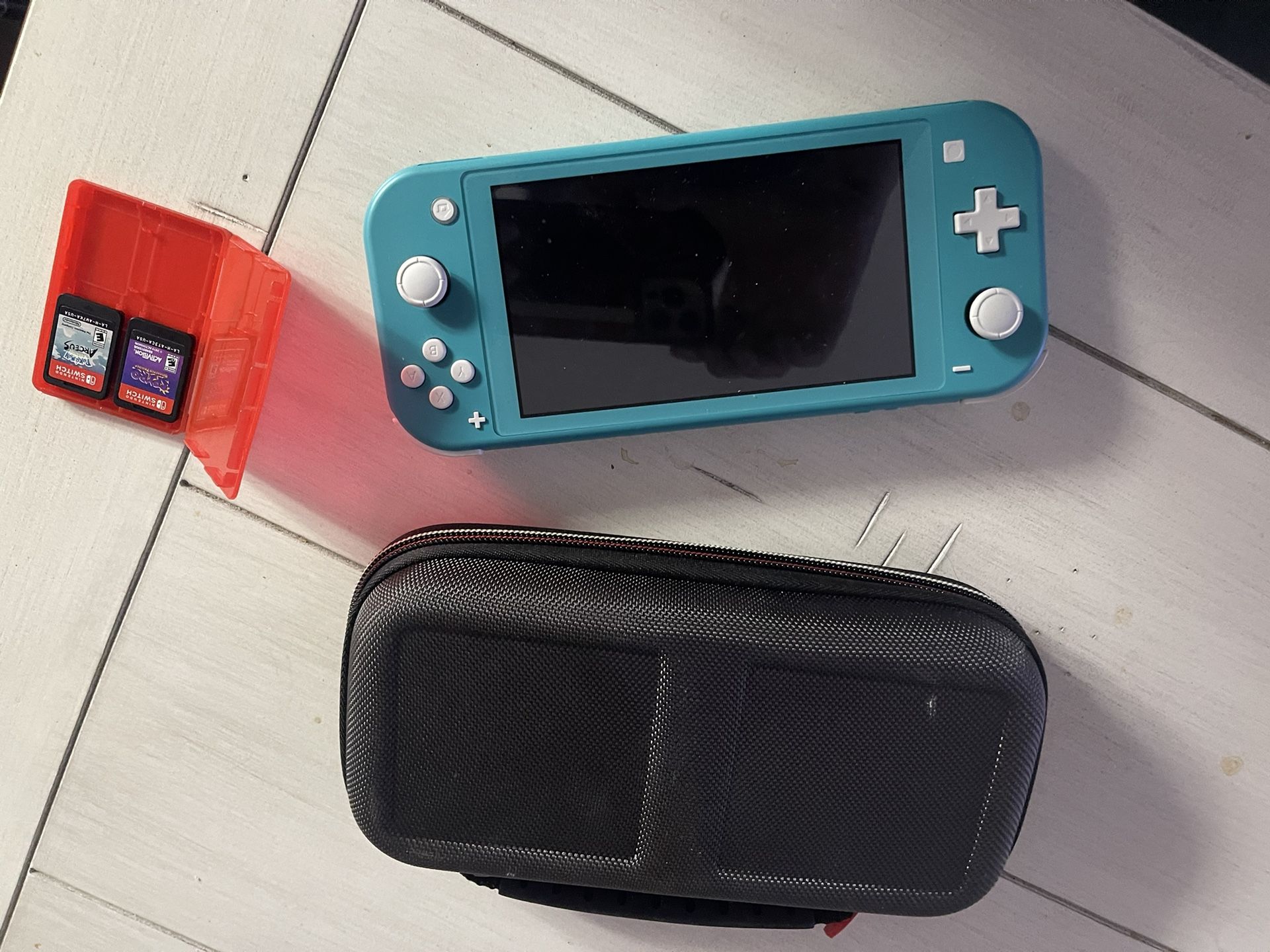 Blue Nintendo Switch With Protecting Case And 2 Games 