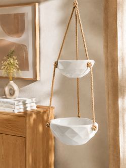 Beautiful modern double hanging ceramic planter with natural rope design.