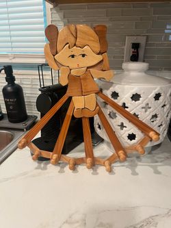 Vintage accordion-style wooden peg rack